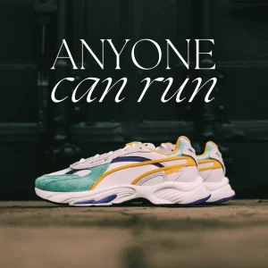 A close-up image of stylish running sneakers placed on a surface : "Anyone Can Run" displayed prominently